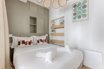 Un ou plusieurs lits dans un hébergement de l'établissement MyKeypers - Design & Cosy Flat 4P - Paris XV