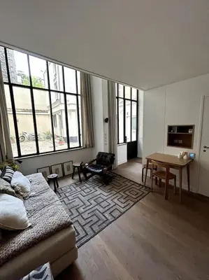 Coin salon dans l'établissement Elegant loft-duplex pour 2/3 personnes