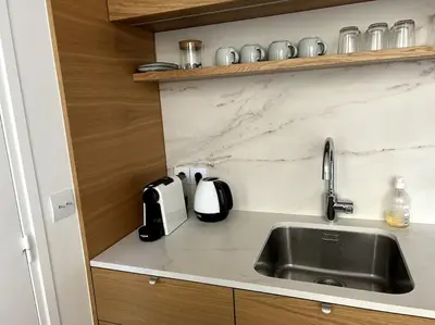 Cuisine ou kitchenette dans l'établissement Elegant loft-duplex pour 2/3 personnes
