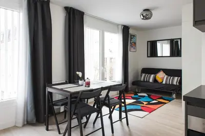 Télévision ou salle de divertissement dans l'établissement HomyParis