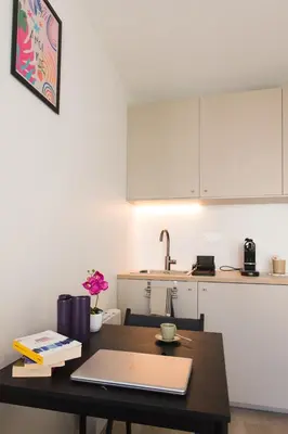 Cuisine ou kitchenette dans l'établissement HomyParis