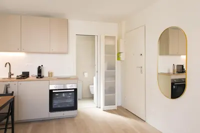 Cuisine ou kitchenette dans l'établissement HomyParis
