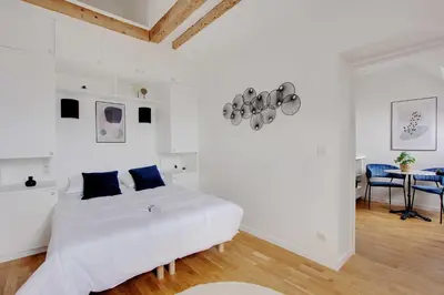 Un ou plusieurs lits dans un hébergement de l'établissement Charming apartment - 1BR-3P -Trocadero