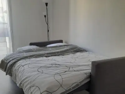 Un ou plusieurs lits dans un hébergement de l'établissement Sublime appartement au coeur de la Défense