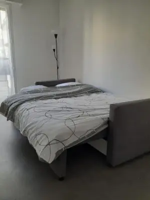 Un ou plusieurs lits dans un hébergement de l'établissement Sublime appartement au coeur de la Défense