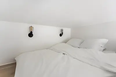 Un ou plusieurs lits dans un hébergement de l'établissement Casa Naranja