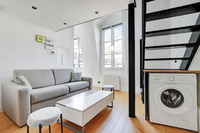 Coin salon dans l'établissement Charming apt with ac -Rue des Archives- le marais