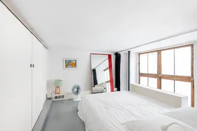 Un ou plusieurs lits dans un hébergement de l'établissement GuestReady - Beau séjour au centre de Paris