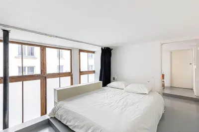 Un ou plusieurs lits dans un hébergement de l'établissement GuestReady - Beau séjour au centre de Paris