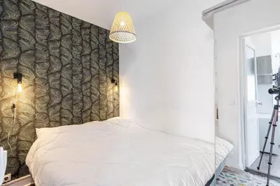 Un ou plusieurs lits dans un hébergement de l'établissement GuestReady - Cosy Nest near Place de la Bastille
