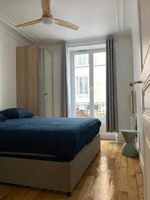 Un ou plusieurs lits dans un hébergement de l'établissement Appartement neuf design - Montmartre