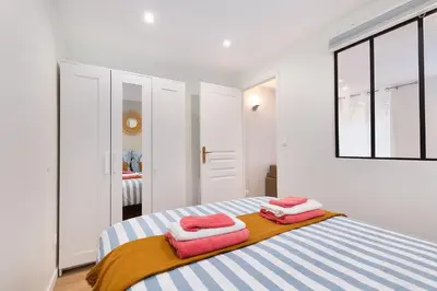 Un ou plusieurs lits dans un hébergement de l'établissement Appartement 2 pièces Boulogne Roland Garros