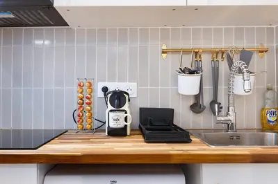 Cuisine ou kitchenette dans l'établissement Appartement 2 pièces Boulogne Roland Garros