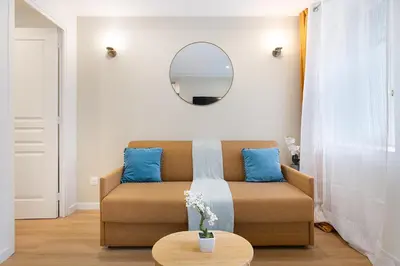 Coin salon dans l'établissement Appartement 2 pièces Boulogne Roland Garros