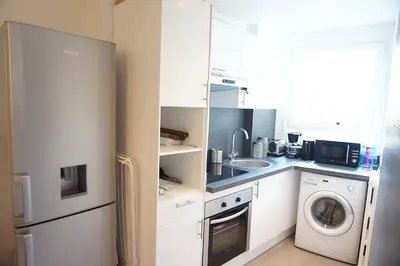 Cuisine ou kitchenette dans l'établissement Montparnasse 1BDR