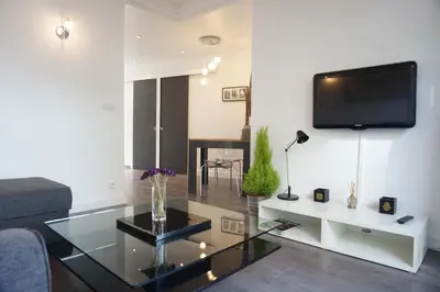 Télévision ou salle de divertissement dans l'établissement Montparnasse 1BDR