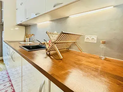 Cuisine ou kitchenette dans l'établissement Charming Apartment Paris - Rentaway BnB