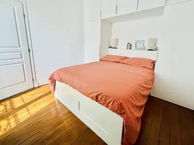 Un ou plusieurs lits dans un hébergement de l'établissement Charming Apartment Paris - Rentaway BnB