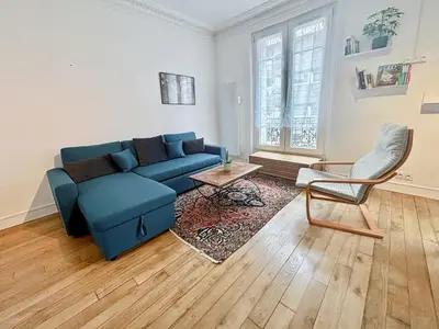 Coin salon dans l'établissement Charming Apartment Paris - Rentaway BnB