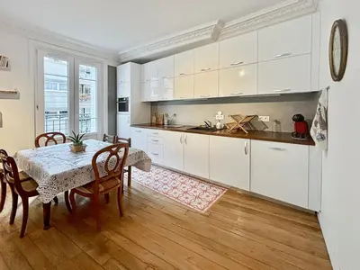 Cuisine ou kitchenette dans l'établissement Charming Apartment Paris - Rentaway BnB