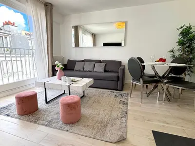 Coin salon dans l'établissement L'appartement Bouquet
