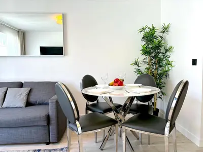 Coin salon dans l'établissement L'appartement Bouquet