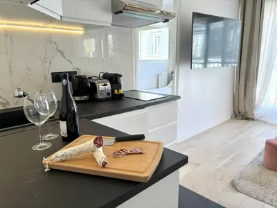 Cuisine ou kitchenette dans l'établissement L'appartement Bouquet