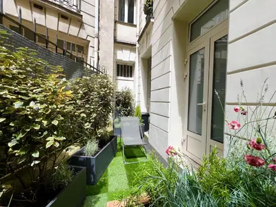 Jardin de l'établissement Magnifique Appartement Paris XVIIe-Tout équipé!