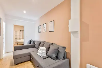 Coin salon dans l'établissement Charme Parisien 6 Personnes, 2 chambres, 19ème