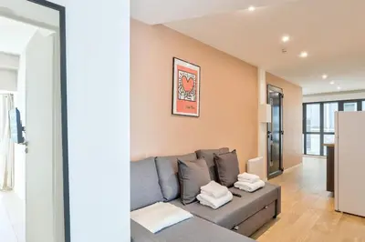 Coin salon dans l'établissement Charme Parisien 4 Personnes, 1 chambre, 19ème