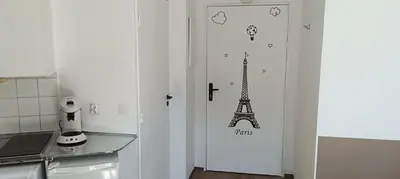Cuisine ou kitchenette dans l'établissement Cosy Studio La Defense