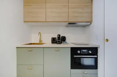 Cuisine ou kitchenette dans l'établissement Peaceful Chic Studio - 2P - Parc Monceau
