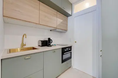 Cuisine ou kitchenette dans l'établissement Peaceful Chic Studio - 2P - Parc Monceau