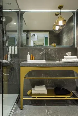 Salle de bains dans l'établissement Hôtel Kyriad Prestige Paris Asnieres