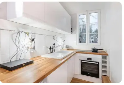 Cuisine ou kitchenette dans l'établissement Charmant appartement proche du Musée Picasso
