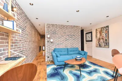 Coin salon dans l'établissement Magnificent apartment- 2BR-6P - Republique