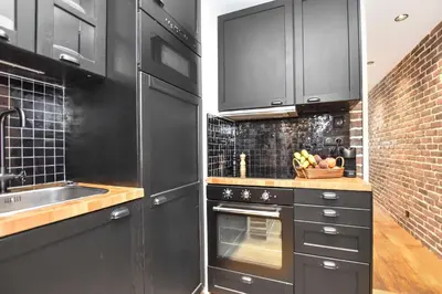 Cuisine ou kitchenette dans l'établissement Magnificent apartment- 2BR-6P - Republique