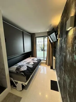 Un ou plusieurs lits dans un hébergement de l'établissement JOIA PARIS - Vaugirard