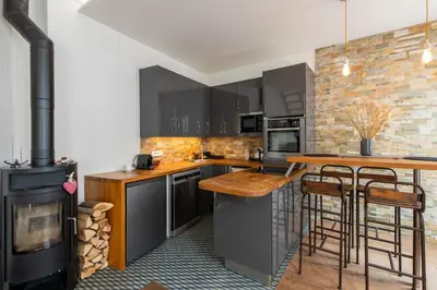 Cuisine ou kitchenette dans l'établissement Amazing loft in the vibrant area near the famous Bastille's Place