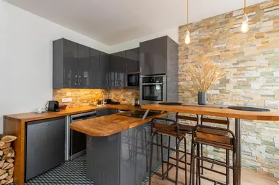 Cuisine ou kitchenette dans l'établissement Amazing loft in the vibrant area near the famous Bastille's Place