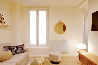 Coin salon dans l'établissement Elegant Apartment - 1BR-2P - Arc de Triomphe