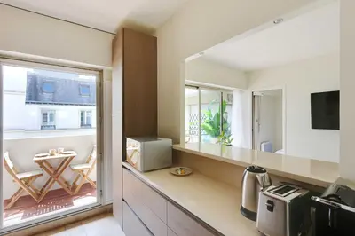 Cuisine ou kitchenette dans l'établissement Chic apartment - 1BR-4P - Place des Vosges
