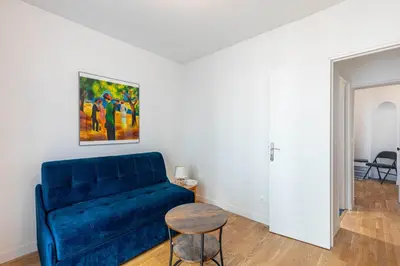 Coin salon dans l'établissement GuestReady - Cozy Retreat near Place de la Nation