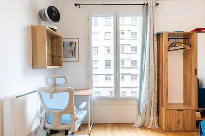 Télévision ou salle de divertissement dans l'établissement GuestReady - Cozy Retreat near Place de la Nation