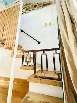 Un ou plusieurs lits dans un hébergement de l'établissement Splendid atypical loft st germain