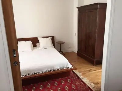 Un ou plusieurs lits dans un hébergement de l'établissement Charmant Appt 2/4 pers Quartier Père Lachaise