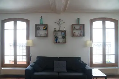 Coin salon dans l'établissement Chaleureux appartement parisien