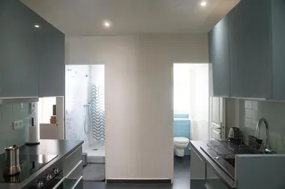 Cuisine ou kitchenette dans l'établissement Chaleureux appartement parisien