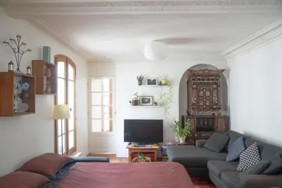 Coin salon dans l'établissement Chaleureux appartement parisien