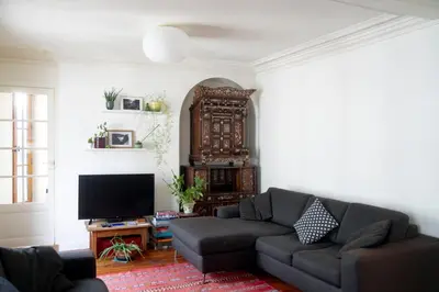 Coin salon dans l'établissement Chaleureux appartement parisien